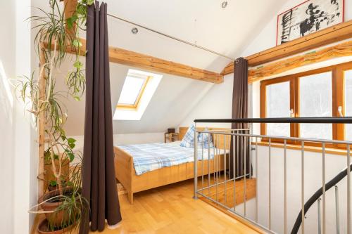 a bedroom with a bed in a attic at Ferienhaus Waldsicht in Flachau