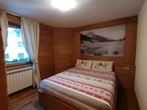 Кровать или кровати в номере Casa Caste - Appartamento Solena