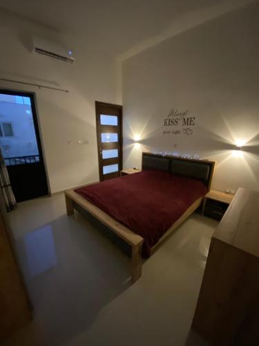 En eller flere senge i et værelse på St Orsola Apartment 2
