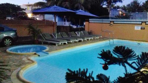 Vista de la piscina de 2 bedrooms appartement at Pointe aux piments 200 m away from the beach with shared pool balcony and wifi o alrededores