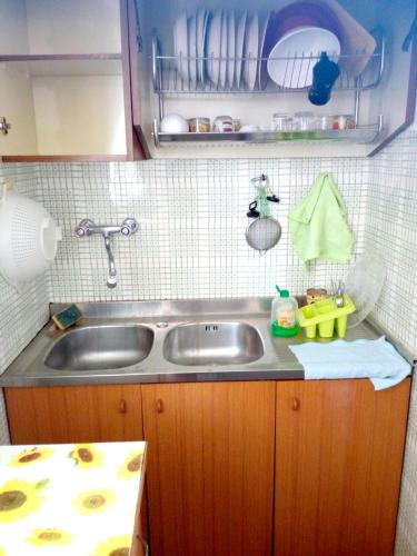 a kitchen counter with a sink in a kitchen at Charming house with sea view in Contrada Termini in Casalbordino
