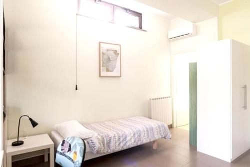 เตียงในห้องที่ 2 bedrooms apartement with wifi at Nicolosi