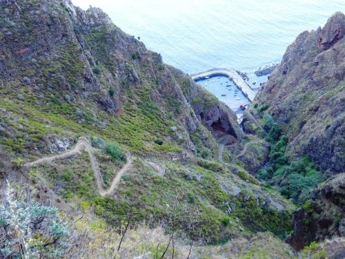 a view of a mountain with the ocean in the background at Elegant House in Calheta, Sea View in Calheta