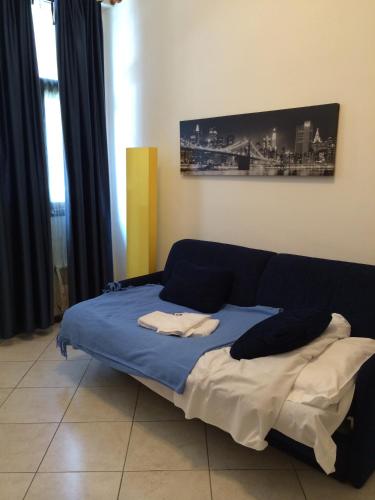 Ένα ή περισσότερα κρεβάτια σε δωμάτιο στο Hotel Riviera Sanremo