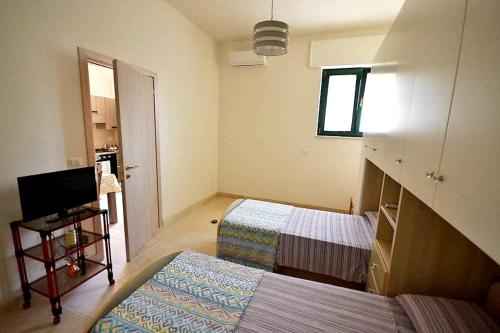 Postel nebo postele na pokoji v ubytování Cosy Apartment in Carovigno: 40 sqm + Near Beaches