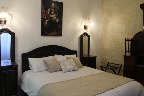 Postel nebo postele na pokoji v ubytování Palazzino Nina Boutique Hotel