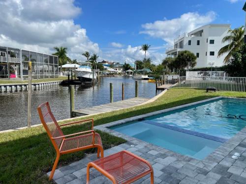 2 Beach Access, Close to Time's Square, On water
