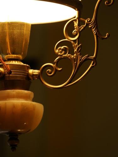 a close up of a lamp with a light at Tilas - Rooms in 19th Century Wooden Townhouse,Kadikoy in Istanbul