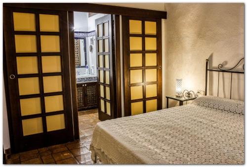 En eller flere senge i et værelse på Casa Tiberíades