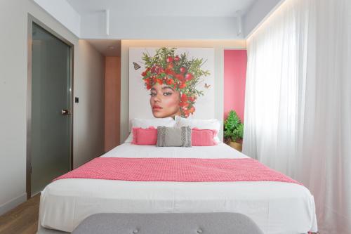 Postel nebo postele na pokoji v ubytování Artree Suites