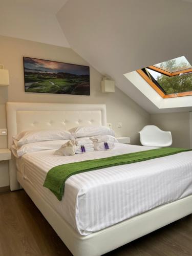 Uma cama ou camas num quarto em Pensión MarViva
