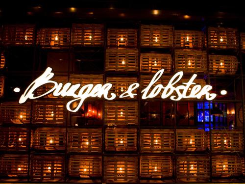 a sign that reads durian and lobster in front of a building at Resorts World Genting - First World Hotel in Genting Highlands