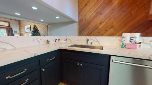 a kitchen with a sink and a counter top at Snowcreek Iii #415 Condo in Mammoth Lakes