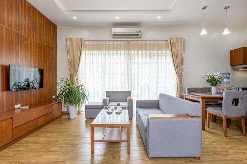 TV a/nebo společenská místnost v ubytování Anh Phát Resort