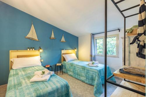 En eller flere senge i et værelse på Casa Cala Luna