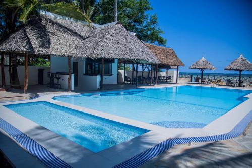 Bazén v ubytování Sheratton Beach Villagio nebo v jeho okolí