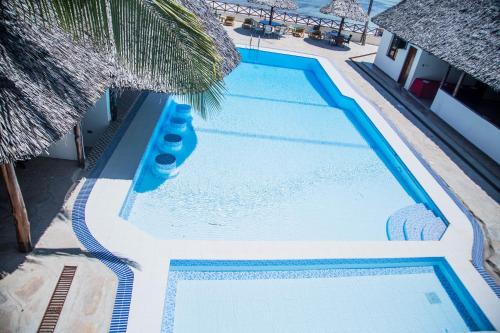 an overhead view of a swimming pool at a resort at Sheratton Beach Villagio in Mombasa
