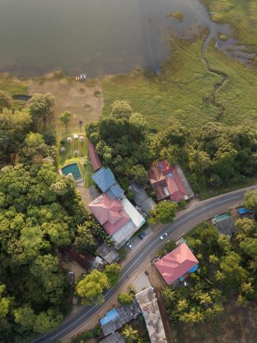 an overhead view of a road in a forest at Mapakada Village - Mahiyanganaya in Mahiyangana