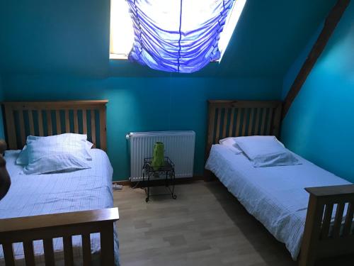 מיטה או מיטות בחדר ב-Cidrerie, Coeur De Combray