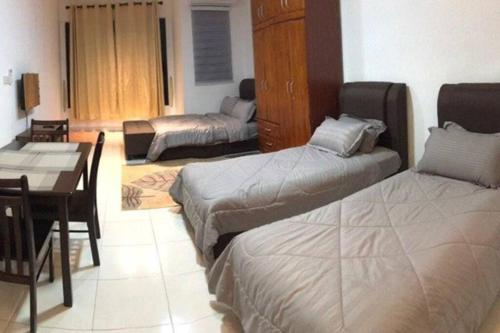 A bed or beds in a room at HomestayBABA close to UKM, GMI, & more !
