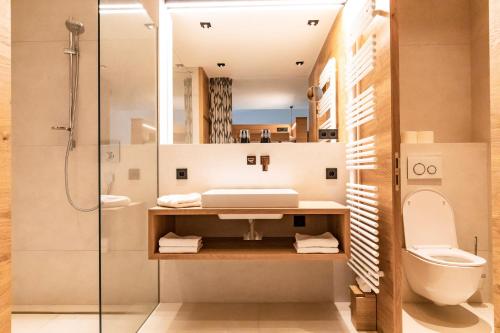 ห้องน้ำของ Hotel & Appartements Alpenresidenz Viktoria