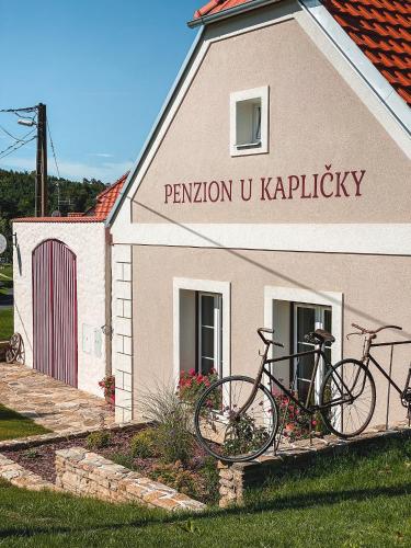 two bikes parked in front of a building at Penzion U Kapličky in Znojmo