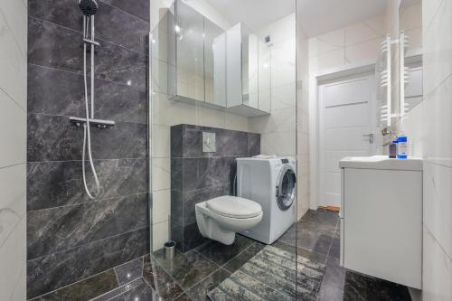 Kúpeľňa v ubytovaní Apartamenty Sun & Snow Spektrum