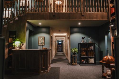 a hallway with a staircase in a house at Hotell Viktors in Sälen