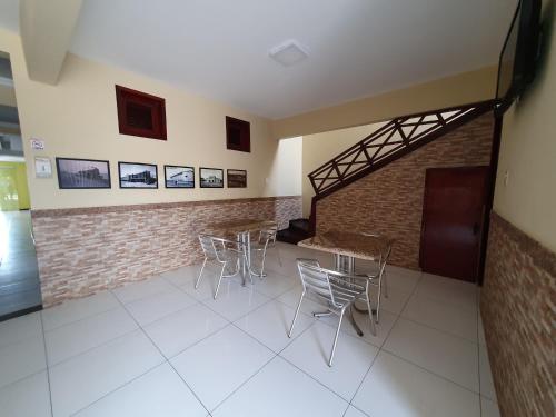 Una televisión o centro de entretenimiento en Hotel Dunas Camocim