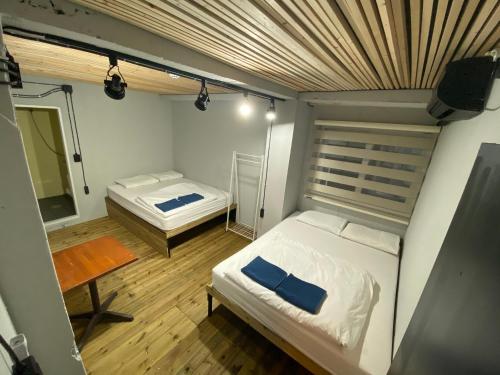 Postelja oz. postelje v sobi nastanitve Itaewon Inn