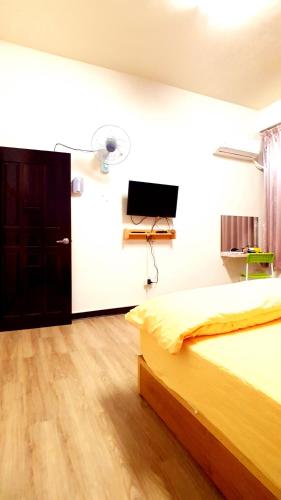 TV a/nebo společenská místnost v ubytování Get Grace Hotel