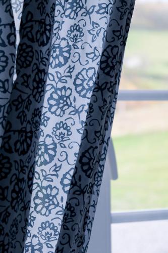 a black and white curtain with a window at Au Nid de Caroline gîte 4 étoiles in Arette