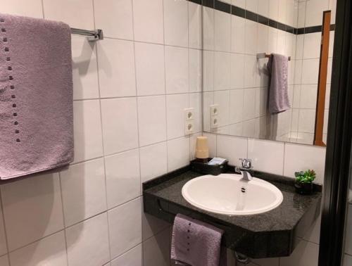 Koupelna v ubytování Hotel Krasemann