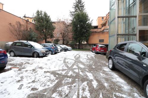 a snow covered parking lot with a star painted on it at Sun Bologna in Bologna