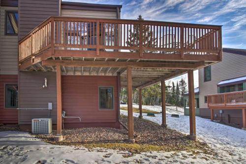 a wooden deck on the side of a house at Lutsen Mountain Townhome - 2 Mi to Lake Superior! in Lutsen