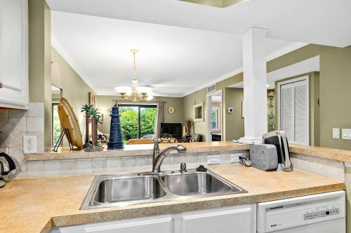 a kitchen with a sink and a counter top at Unit 3127 - Ocean & Racquet Club in Saint Augustine Beach