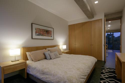 Cama o camas de una habitación en Apartamentos Buenos Aires
