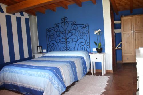 Säng eller sängar i ett rum på Llosa de Ibio