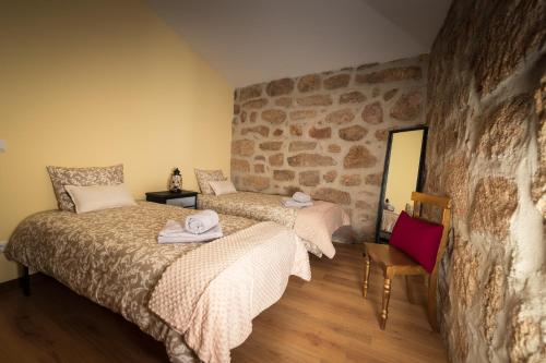 Ένα ή περισσότερα κρεβάτια σε δωμάτιο στο Casa do Parente