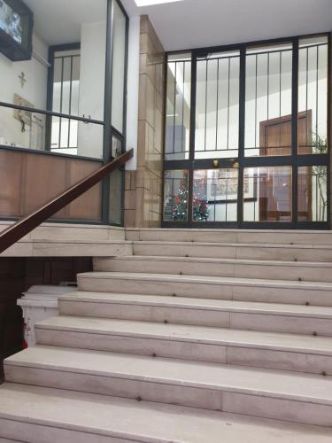 a set of stairs in front of a building at Alba central City in Palermo