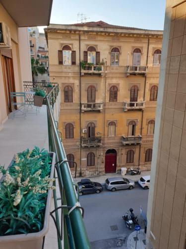 a view of a building from a balcony at Alba central City in Palermo