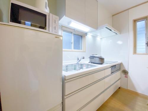 Virtuvė arba virtuvėlė apgyvendinimo įstaigoje nestay villa tokyo takanawa