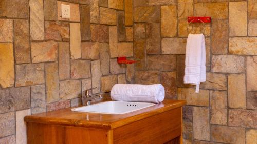 Ванна кімната в Kisubi Forest Cottages
