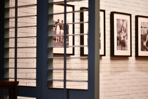 a group of pictures on a brick wall at Andaz Shenzhen Bay Book 2 nights and above enjoy special offer in Shenzhen