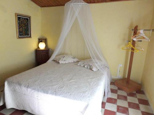 A bed or beds in a room at Appartement de 2 chambres avec jardin clos et wifi a Feliceto