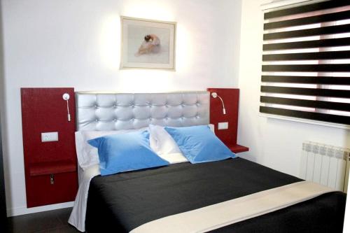 Un ou plusieurs lits dans un hébergement de l'établissement One bedroom appartement with furnished terrace and wifi at Olot