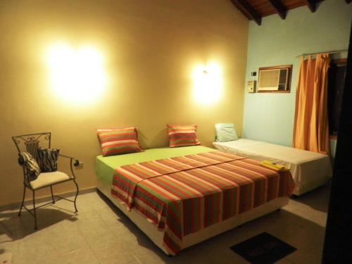 Ένα ή περισσότερα κρεβάτια σε δωμάτιο στο Hotel Las Residentas
