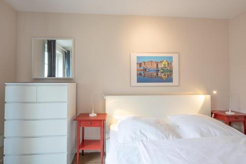 Ένα ή περισσότερα κρεβάτια σε δωμάτιο στο Kleiner Austernfischer