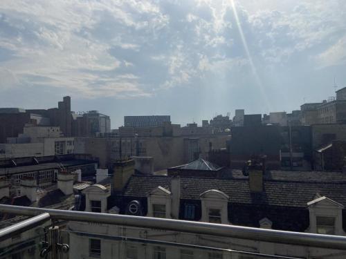 a view of a city skyline with buildings at Hard Days Night Hotel in Liverpool