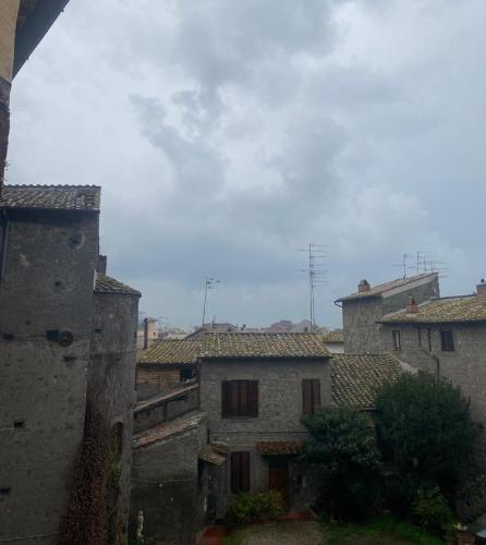 a group of buildings in a city with a sky at L'Albero della Vita in Viterbo